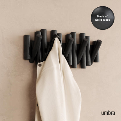 Umbra coat rack — wall-mounted design with hooks for storage