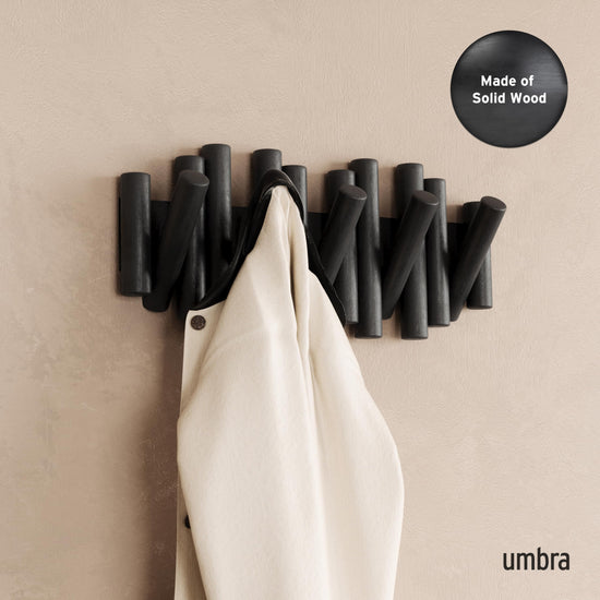 Umbra coat rack — wall-mounted design with hooks for storage