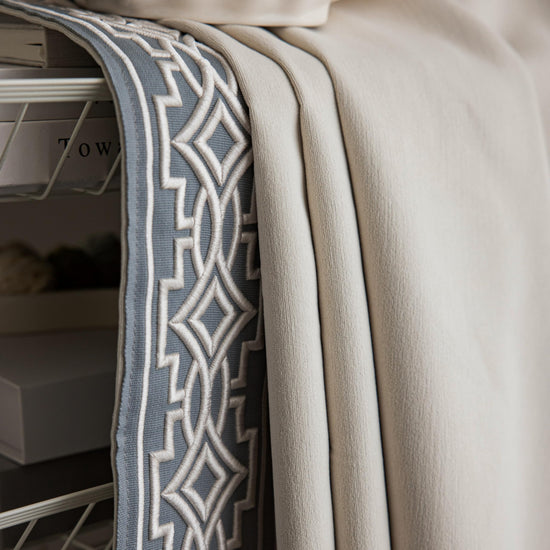 VisionaryHomeDesign curtain panels with embroidered design and tape trim
