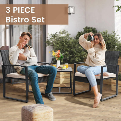 Murago 3 piece wicker patio bistro set with coffee table in black frame and cushion