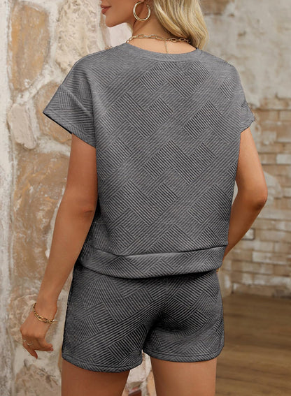 Dokotoo coordinated outfit with pullover top and drawstring shorts set.