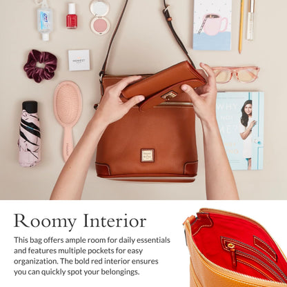 Dooney & Bourke handbag — Pebble grain leather with adjustable shoulder strap