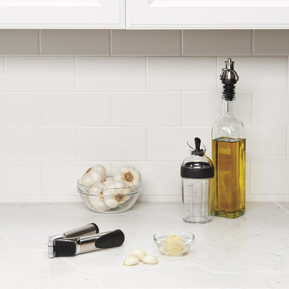 OXO Good Grips food shaker — little salad dressing dispenser
