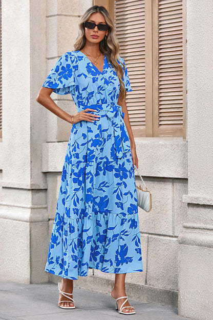 Dress — Swiss dot maxi with wrap v neck and flutter sleeves by Mascomoda
