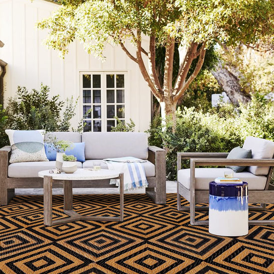 Ridota reversible rug — modern plastic straw design for outdoor use