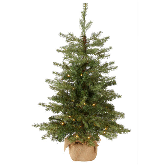 National Tree Company pre-lit artificial mini Christmas tree - 'Feel Real' design, 3 feet tall, burlap bag base and white lights.