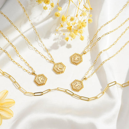 Necklace — Dainty initial design in 14K gold-plated finish by M MOOHAM
