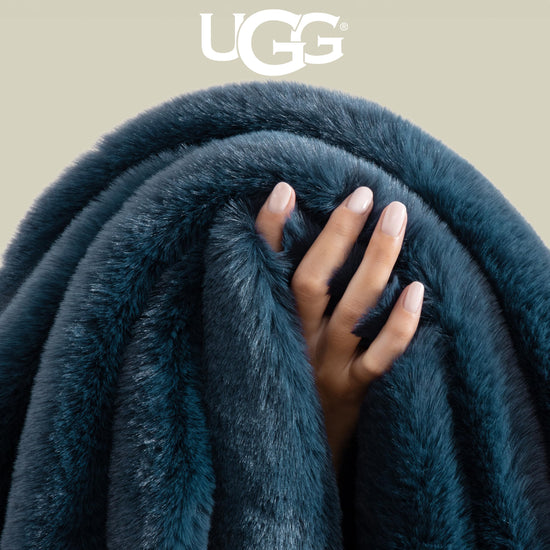 UGG Euphoria plush faux fur reversible blanket for luxury hotel style couch