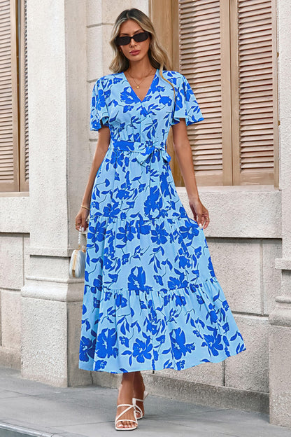 Dress — Swiss dot maxi with wrap v neck and flutter sleeves by Mascomoda