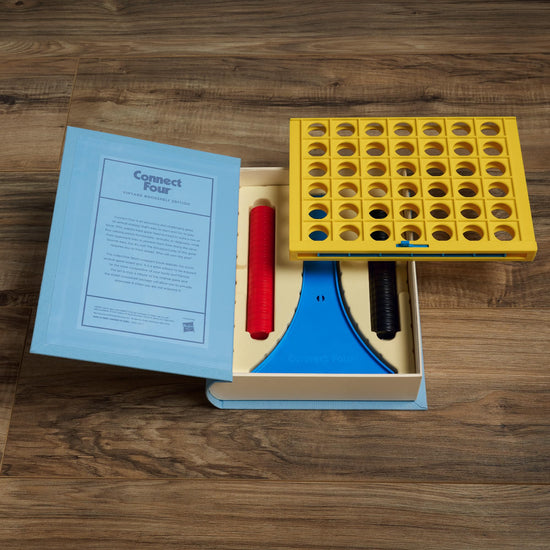 Connect Four vintage bookshelf edition — fabric-wrapped book box display