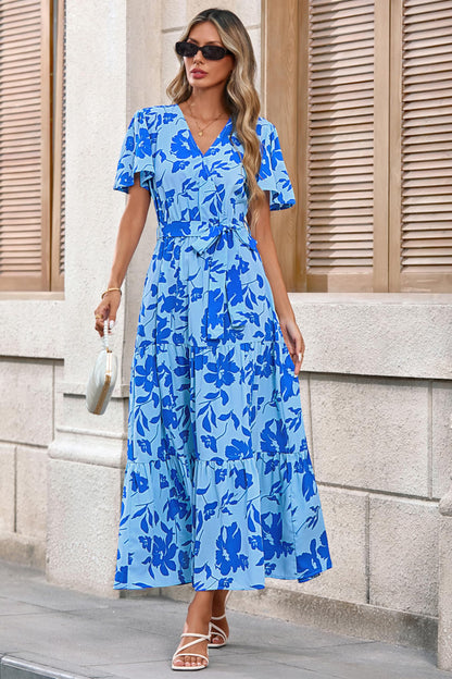 Dress — Swiss dot maxi with wrap v neck and flutter sleeves by Mascomoda